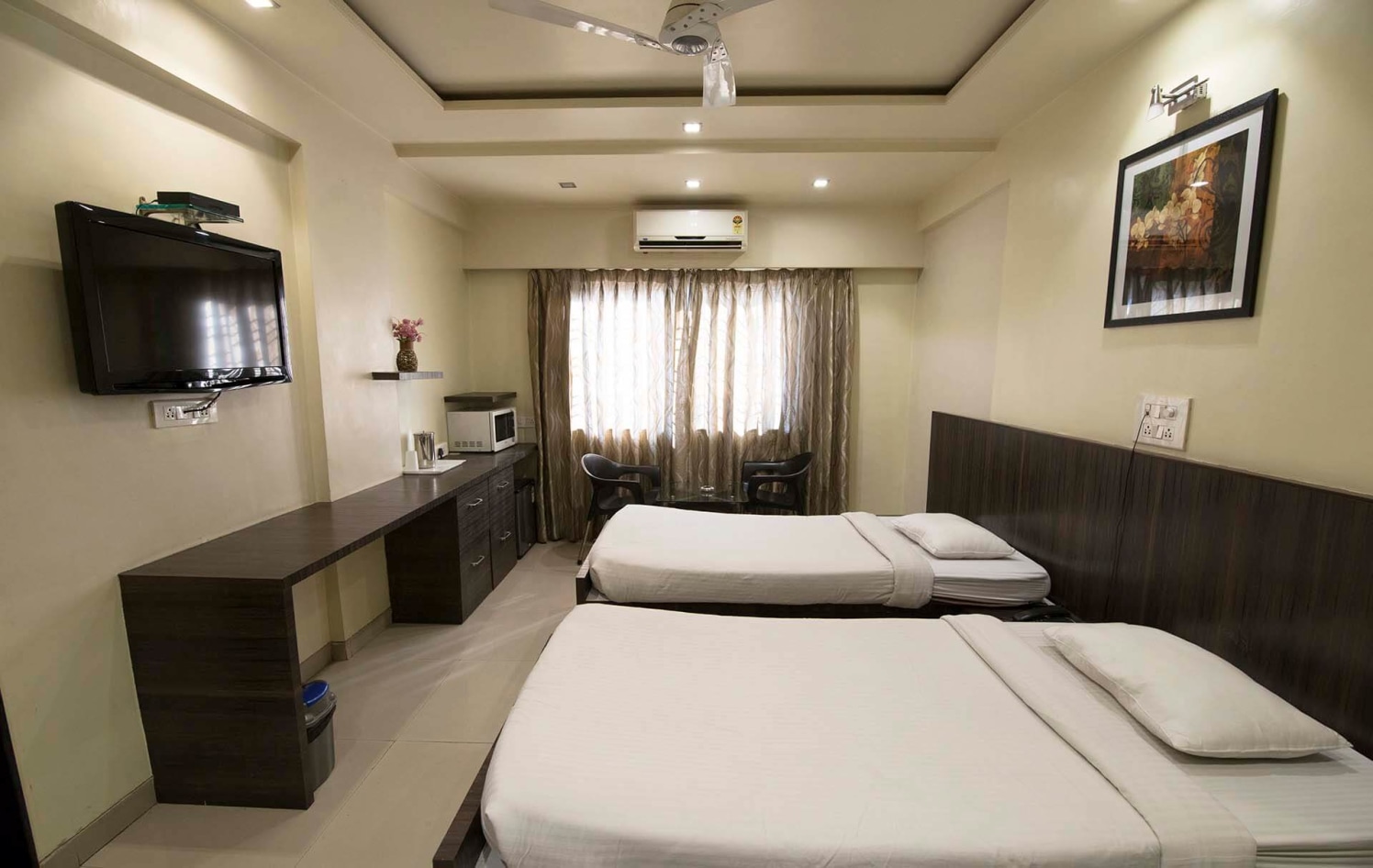 Basic Bedroom with Wood Finished Single Beds and Wooden Display Unit by Trupti Ladda Bedroom Minimalistic | Interior Design Photos & Ideas