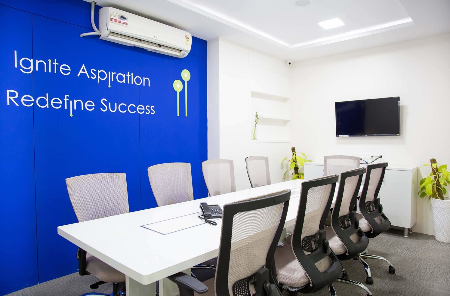 Conference Room with White Table and Blue Wall by Trupti Ladda Contemporary | Interior Design Photos & Ideas