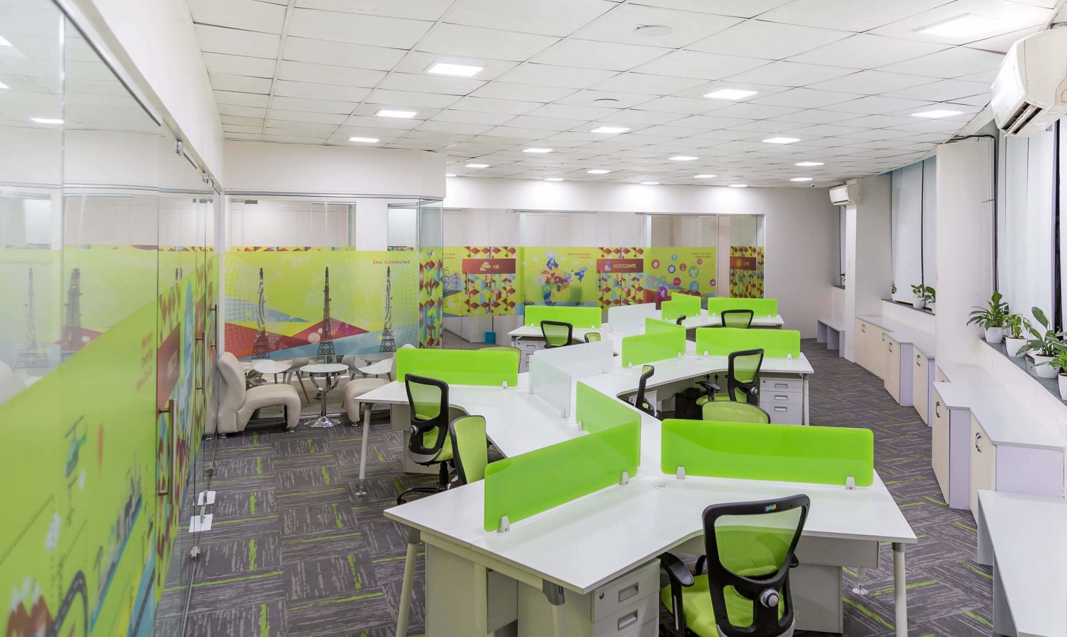 Green and White Themed Work Space with White Desks and green Chairs by Trupti Ladda Contemporary | Interior Design Photos & Ideas