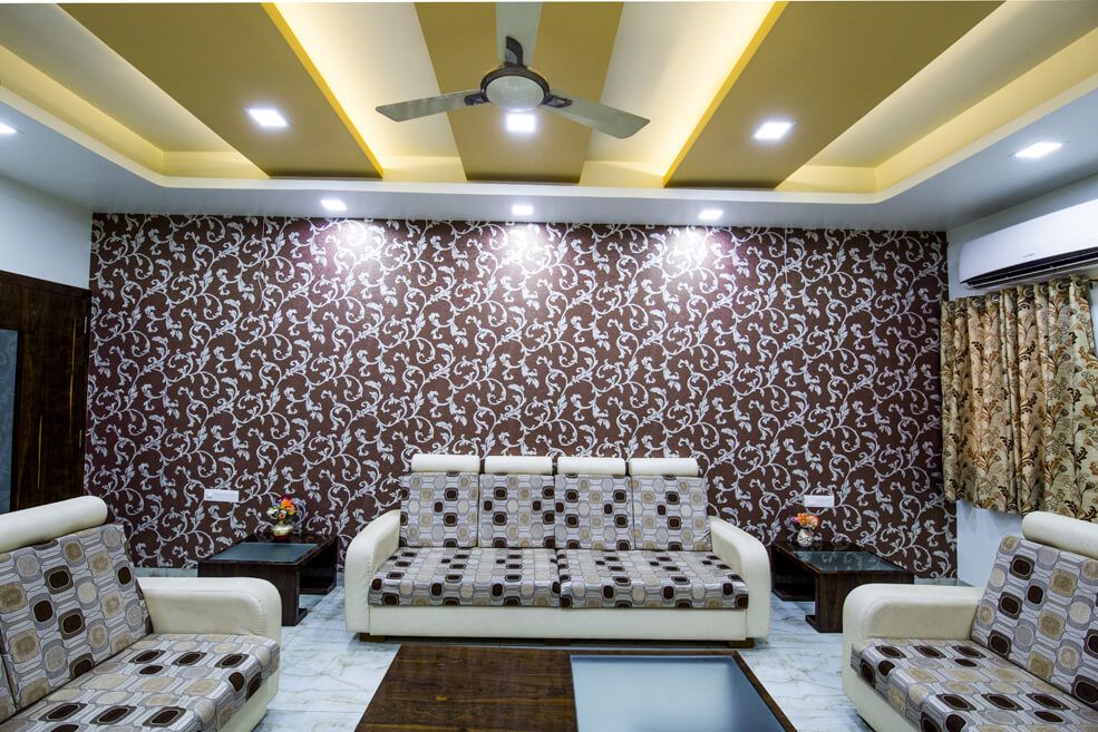Living Room with Beige Sofa Set and Floral Designed Wall by Trupti Ladda Living-room Contemporary | Interior Design Photos & Ideas