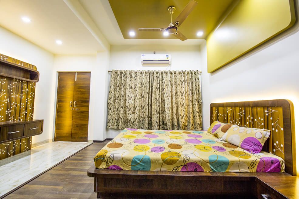 brown Theme Bedroom with Queen Size Bed and Wood Flooring by Trupti Ladda Bedroom Minimalistic | Interior Design Photos & Ideas