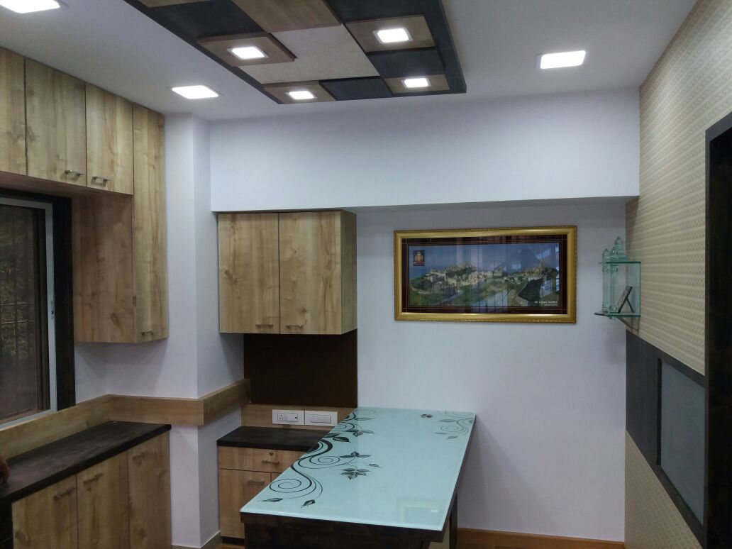 Parallel Kitchen with wooden cabinets and false ceiling by Nidhi Rathod Modular-kitchen Contemporary | Interior Design Photos & Ideas