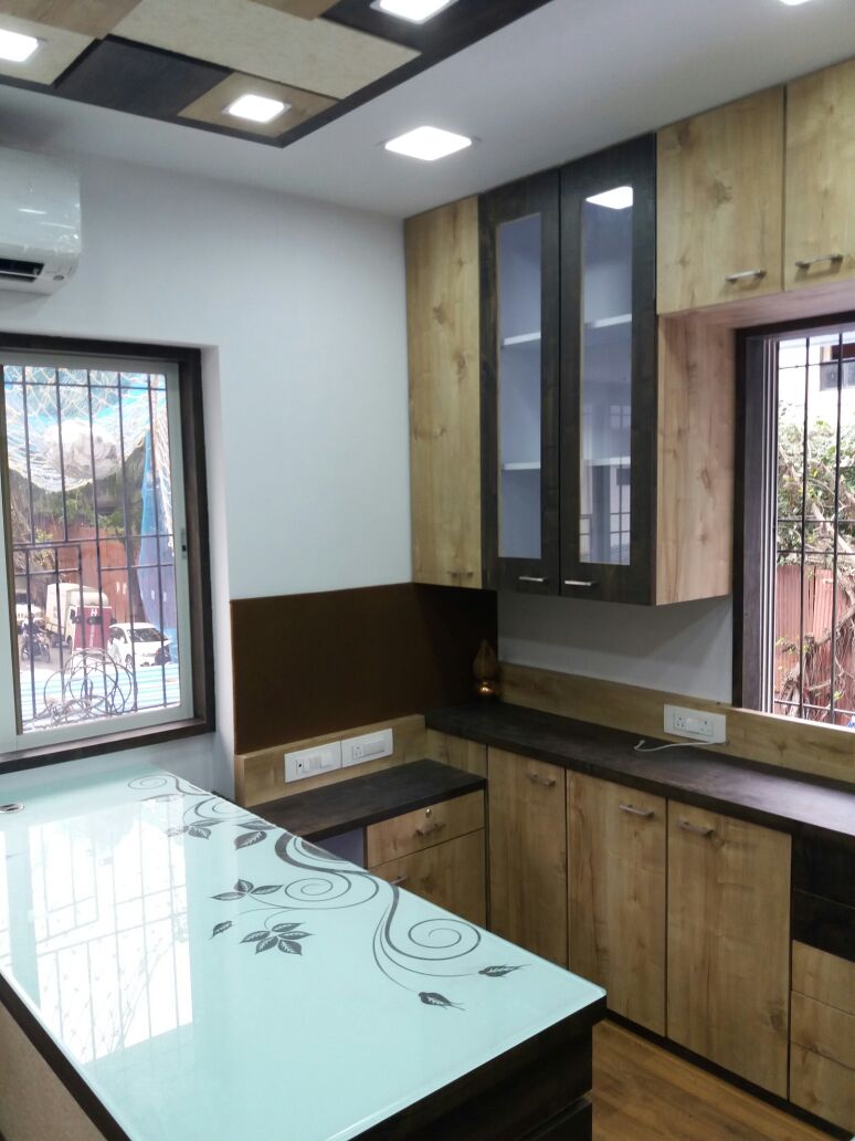 Parallel Kitchen with wooden cabinets by Nidhi Rathod Modular-kitchen Modern | Interior Design Photos & Ideas