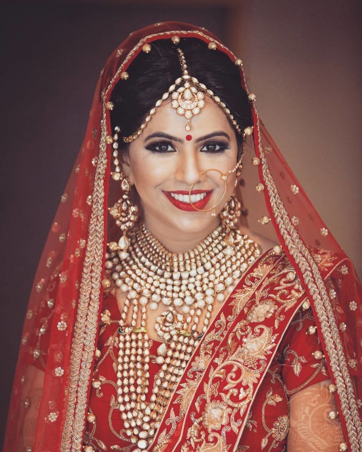 Ravishing Bride In Golden Polki Kundan Jewellery by Akshat 