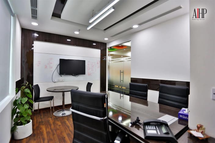 Small And Cozy Office With Wooden Floor False Ceiling By