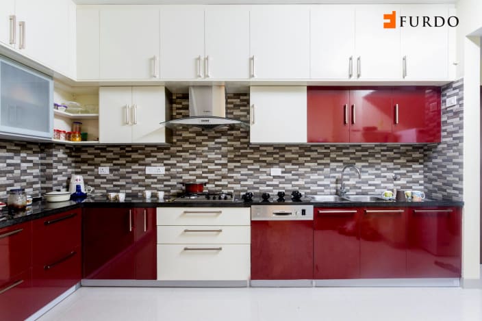 L shape kitchen with red white cabinets by Furdo com 