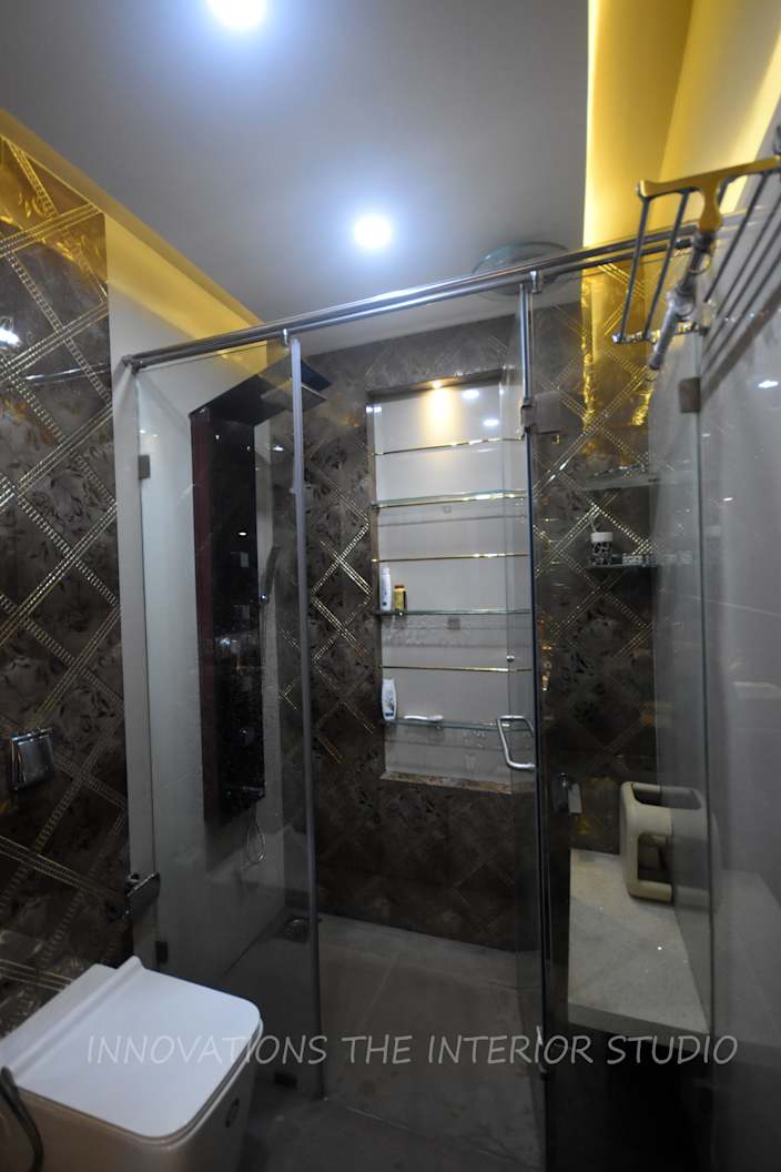 White Sanitaryware And Walk In Glass Door Cubicle By Innovations The Interior Studio