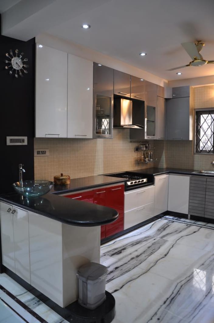 U shaped kitchen with modern cabinets and wall decor by Prashant Mali  UrbanClap