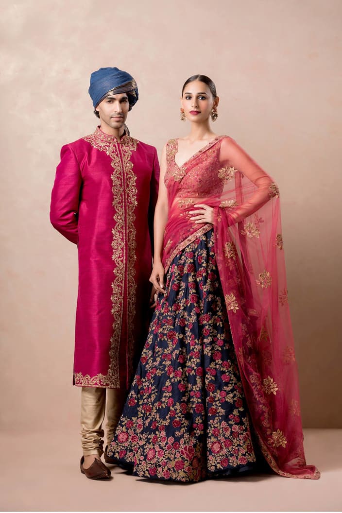 blue sherwani with red lehenga