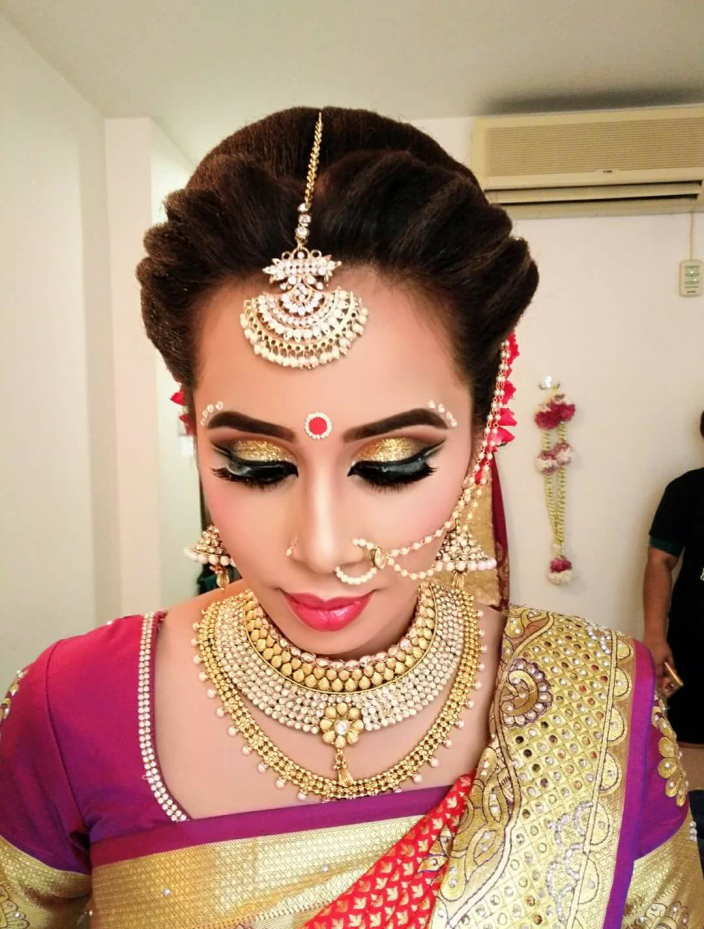 Front Twisted Bridal Bun And Accessories By Sheetal Verma