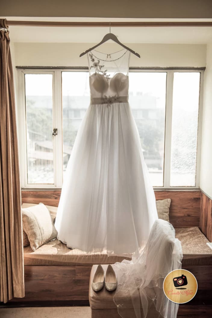 White Colored Bridal Gown With Delicate Work By Candid Affair