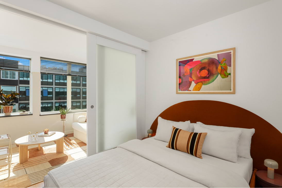 View of the designer bedroom at Harrison Urby - luxury Harrison NJ apartments for rent