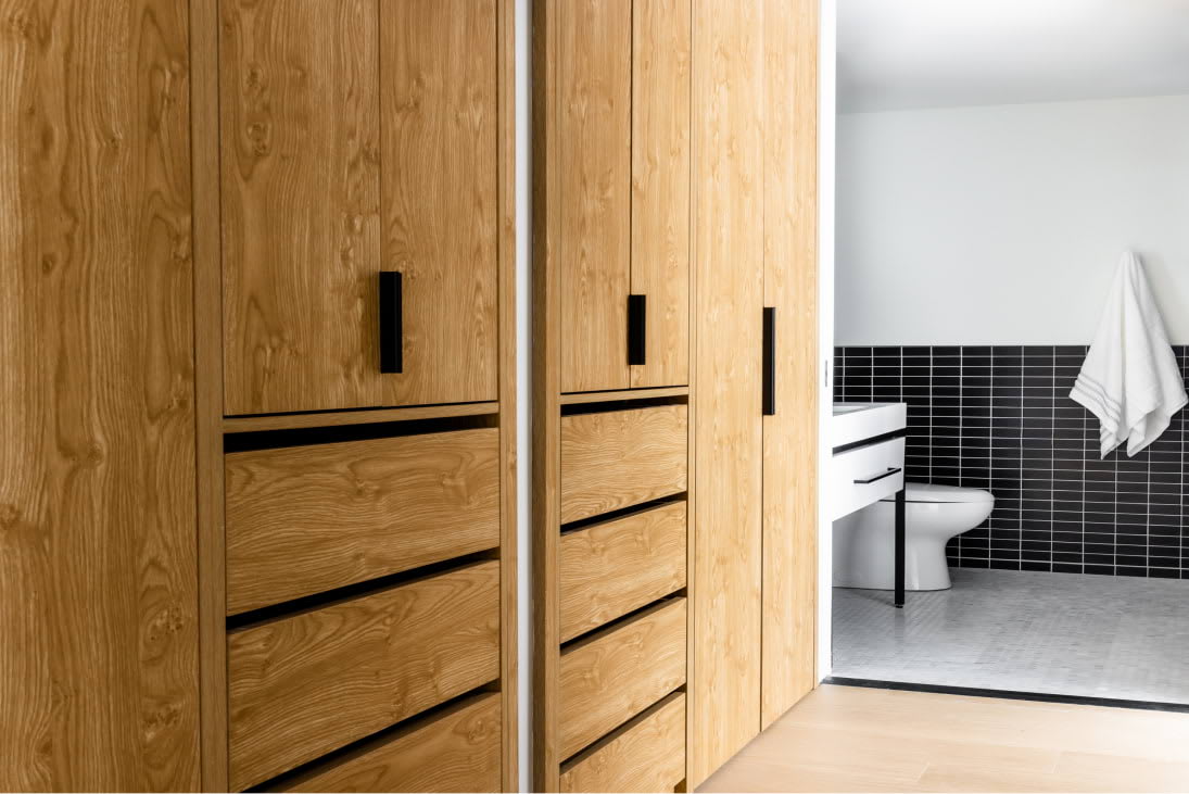 View of custom built-in closets at Dallas Urby - luxury Dallas Design District apartments for rent