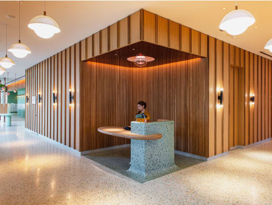 View of lobby with 24/7 welcome desk - luxury short-term furnished apartment rentals in Dallas TX