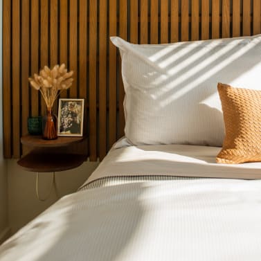 View of the designer bedroom details at Newark Urby - luxury Newark NJ apartments for rent