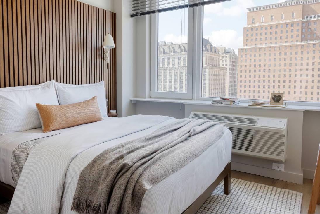 View of the designer bedroom details at Newark Urby - luxury Newark NJ apartments for rent