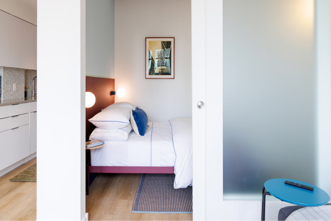 View of the designer bedroom details at Newark Urby - luxury Newark NJ apartments for rent