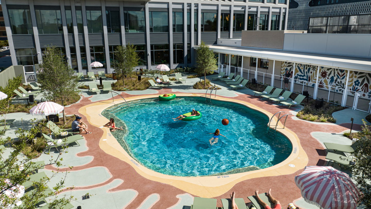 Oasis style pool and courtyard at Dallas Urby - luxury short-term furnished apartment rentals in Dallas TX