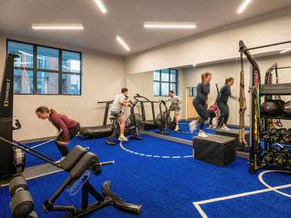 View of turf lined gym and fitness space at Fishtown Urby - luxury Fishtown Philadelphia apartments for rent