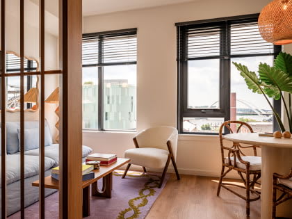 View of bright and cozy designer studio apartment at Navy Yard Urby - luxury Navy Yard apartments for rent in Washington DC