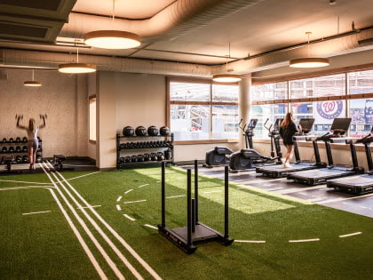 View of light-filled, state-of-the-art gym at Navy Yard Urby - luxury Navy Yard apartments for rent in Washington DC