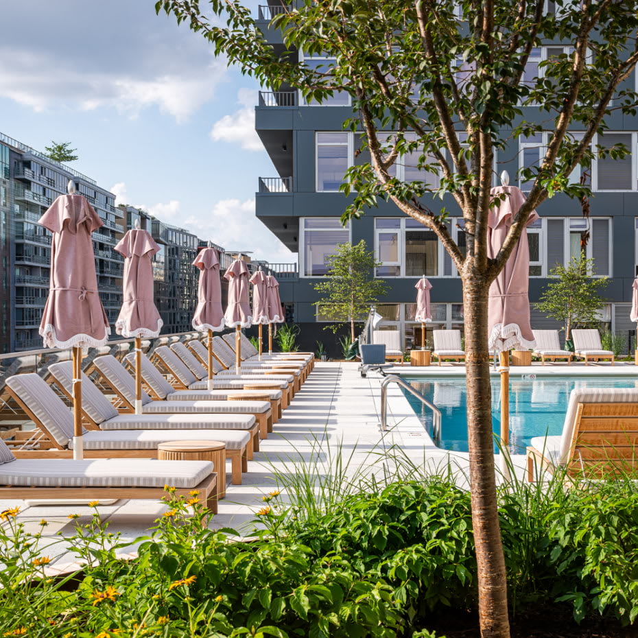 View of oasis-style rooftop pool deck at Navy Yard Urby - luxury Navy Yard apartments for rent in Washington DC