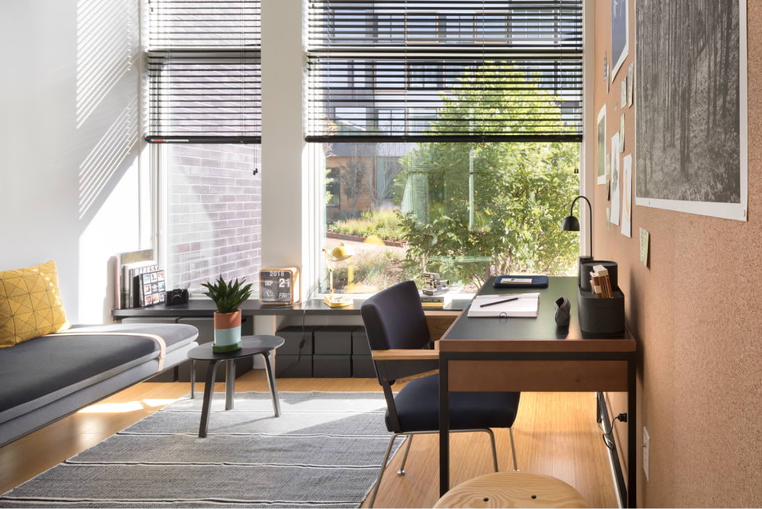 Deep sill-shelves and lush courtyard views.