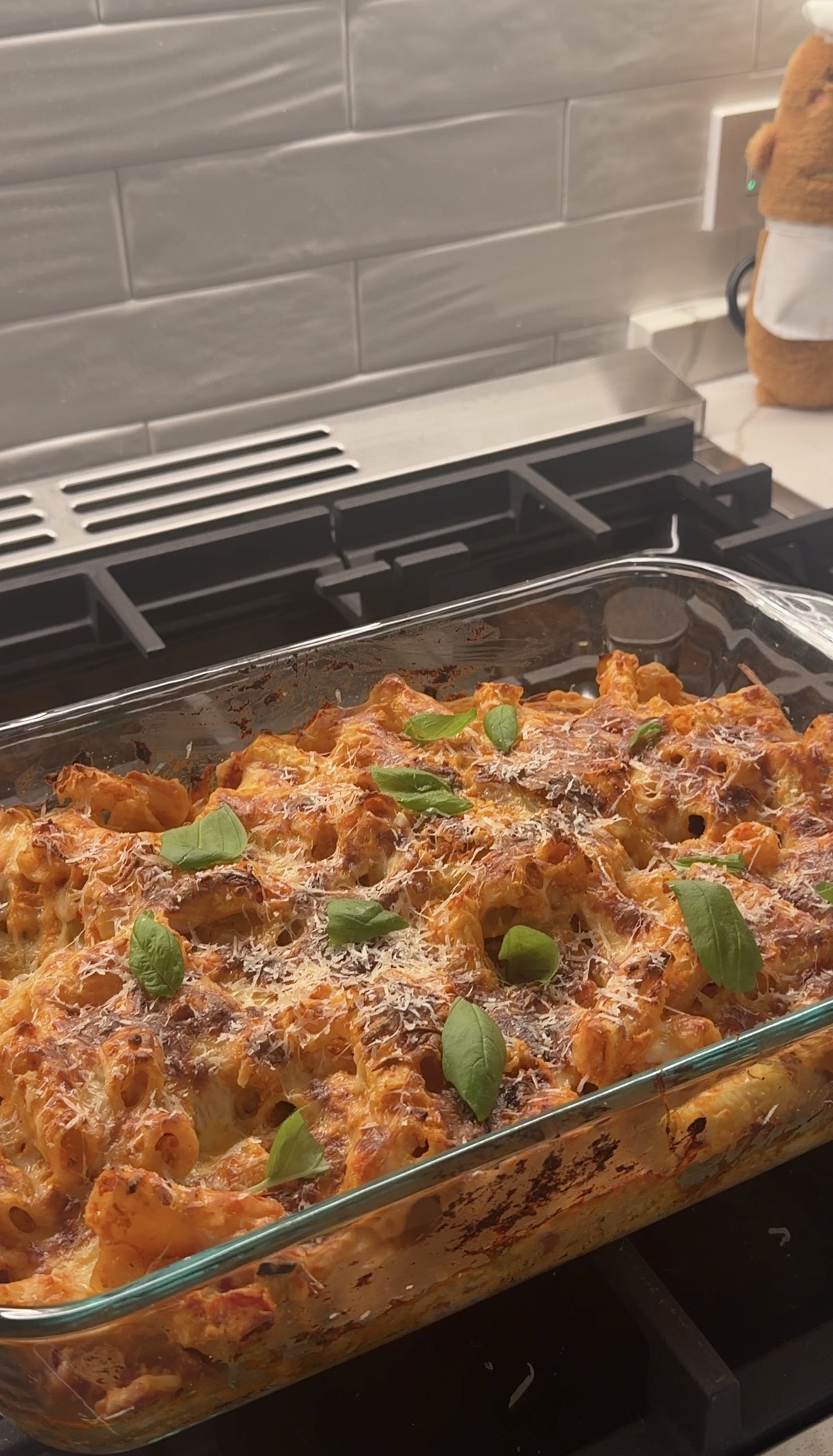 cheesy baked rigatoni with ricotta, mozzarella, marinara, and fresh basil