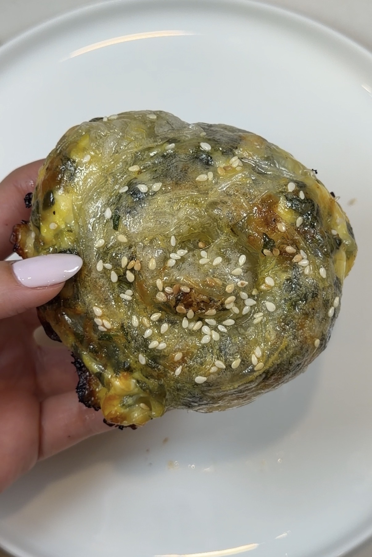 crispy rice paper spanakopita filled with spinach, feta, and mozzarella