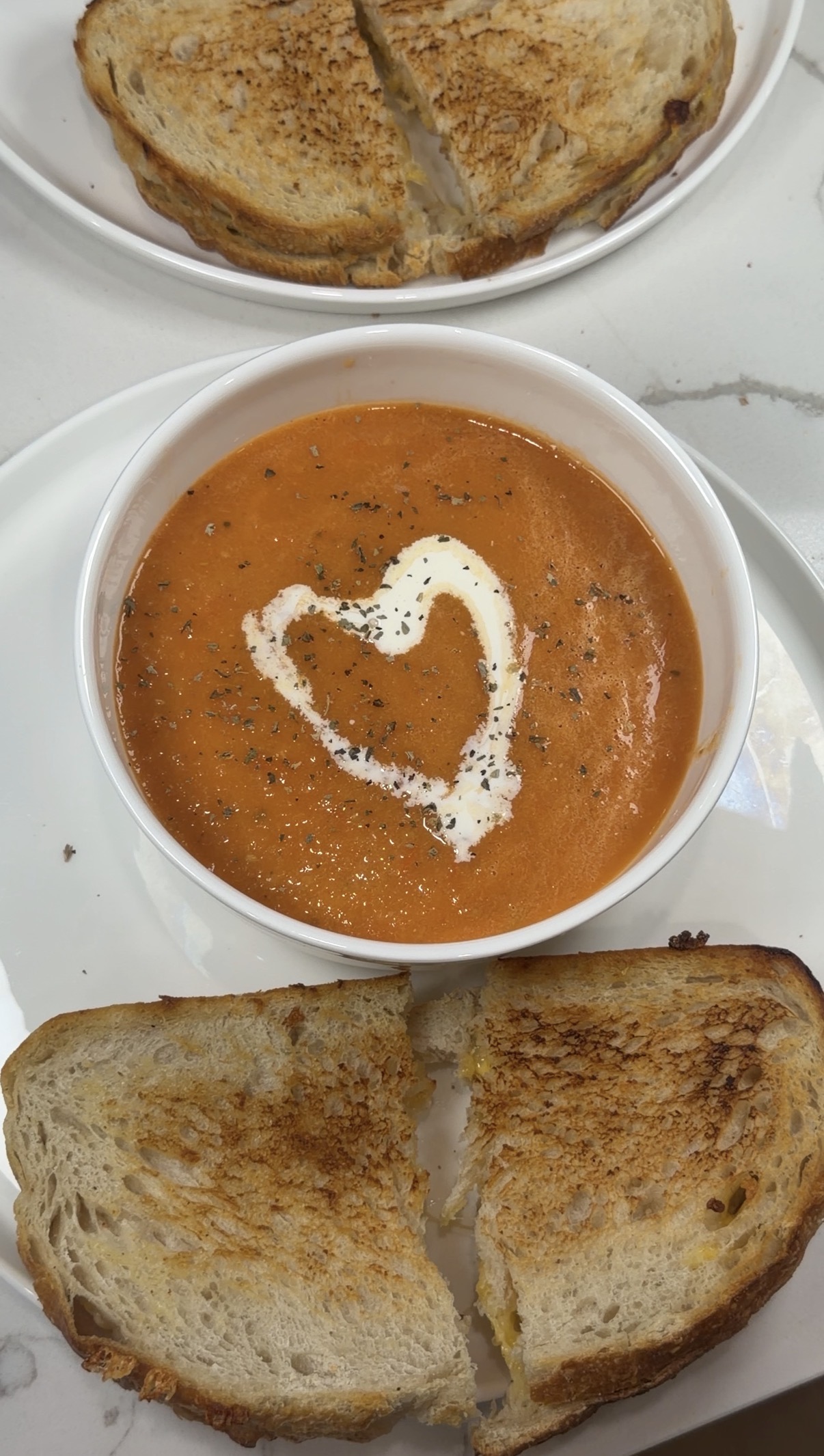 creamy oven-roasted tomato soup made with Roma and Campari tomatoes, basil, and thyme