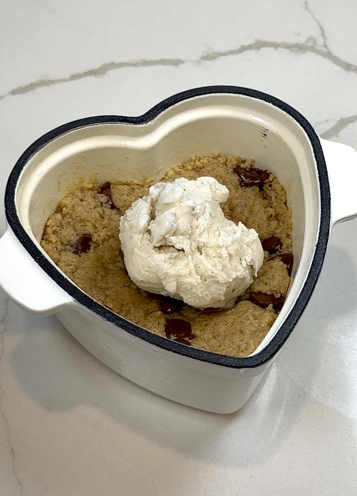 mini brown butter chocolate chip cookie skillet served warm with vanilla ice cream