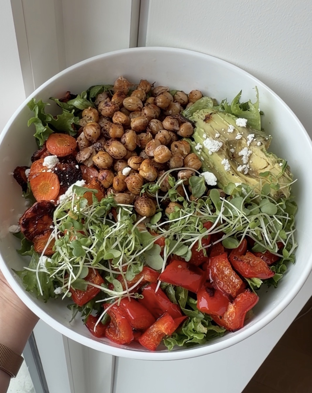 roasted chickpea salad with avocado, carrots, red bell pepper, lettuce, and goat cheese