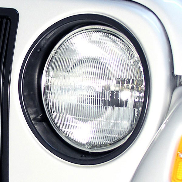 AM Black Headlight Bezels 97-06 Jeep Wrangler SKU 12419.23