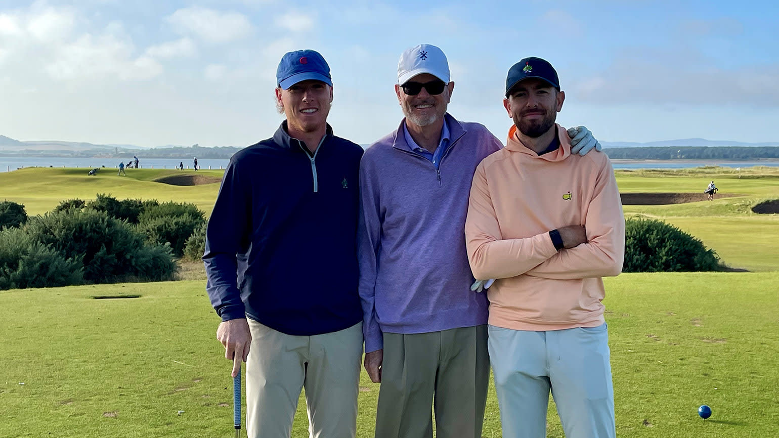 While P.J. Boatwright III (center) didn't follow his legendary father into golf administration, he passed down the passion for the game to sons Jack (left) and Graham. This photo was taken on the Old Course at St. Andrews.(Boatwright Family)