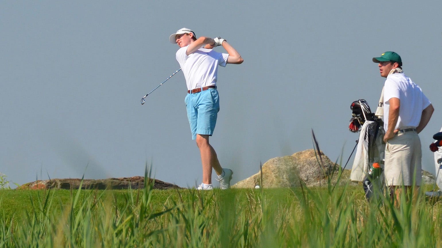 Jack Boatwright (left) gravitated to competitive golf much earlier than older brother, Graham (seen caddying), but the U.S. Amateur Four-Ball has given them both a chance to enjoy each other's company at a high level of competition. (Boatwright Family)