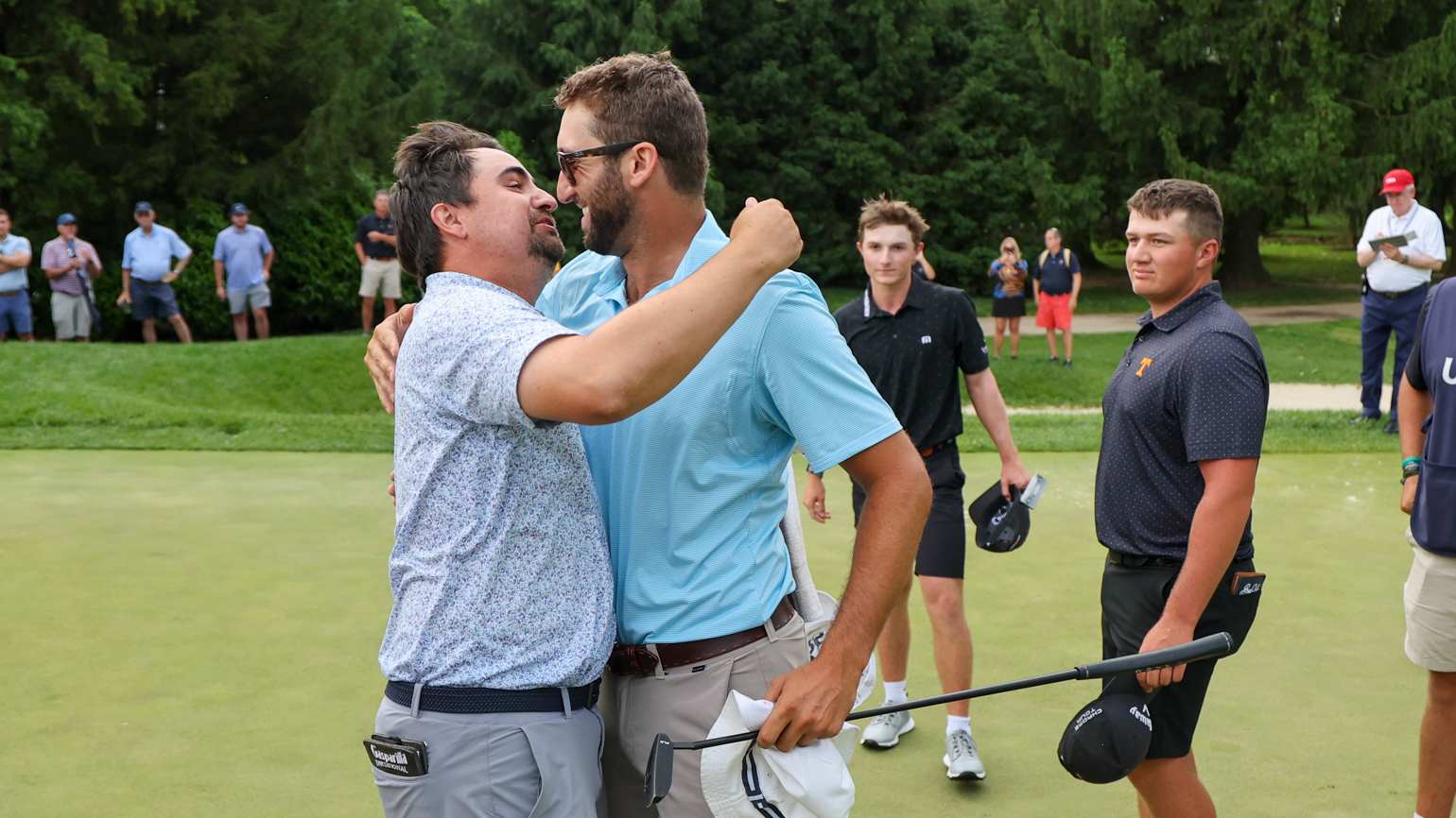 Brian Blanchard (left) and Sam Engel celebrate their 2-up victory in Wednesday's championship match at Philadelphia Cricket Club. (USGA/Jonathan Ernst)