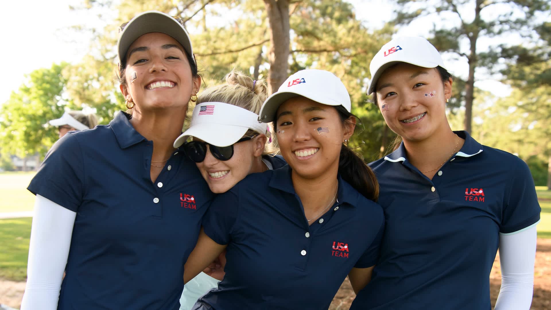 U.S. National Jr. Team members Amelie Zalsman, Scarlett Schremmer, Jude Lee, Nikki Oh smile for a photo