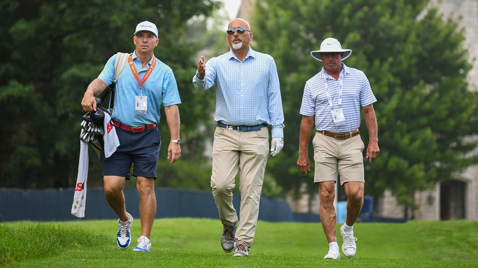 Hank Kuehne (center), the 1998 U.S. Amateur champion, prepared for his U.S. Senior Open debut this week at Scioto Country Club by competing against his brother/caddie, Trip, and The Vaquero Club's director of instruction, Steve Johnson. (USGA/Edward M. Pio Roda)