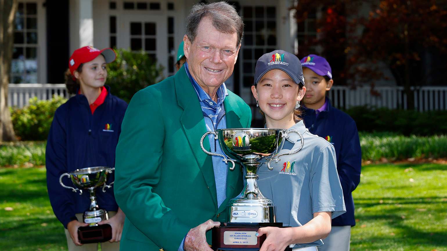 Four years ago, Jenna Kim won the Girls' 12-13 Division of the Drive, Chip & Putt competition at Augusta National Golf Club and was presented her trophy by eight-time major champion Tom Watson. (Chris Trotman/Augusta National)