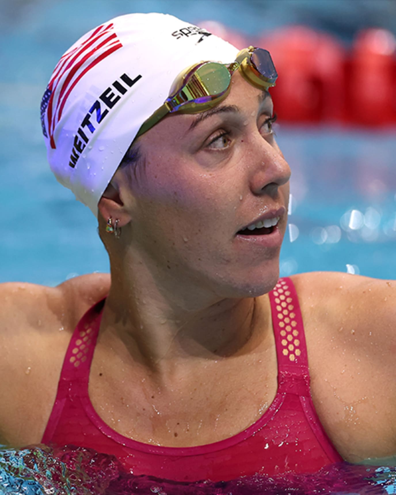 Abbey Weitzeil looks across the pool from the swim lane