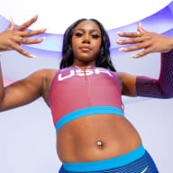 Brittni Mason poses on set in her Team USA uniform at a photoshoot in Los Angeles, California.