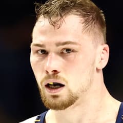 Spencer Lee reacts after defeating Thomas Gilman to win the men's freestyle 57-KG division during the US Olympic Wrestling Trials held at the Bryce Jordan Center on April 20, 2024 in State College, Pennsylvania.