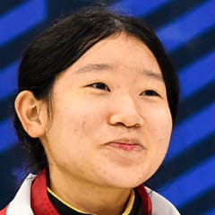 Eunice smiling and racing