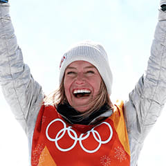 Jamie with hands in the air