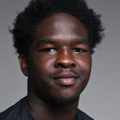 Justin McMullen posing for a portrait.