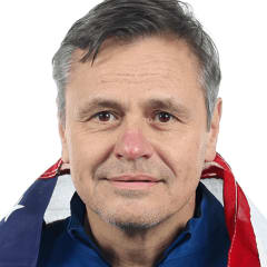 Mike Tagliapietra posing for a portrait.