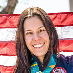 Dania Vizzi smiling and holding her gold medal