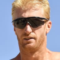 Chase Budinger reacts during the match against Jake Gibb and Taylor Crabb during the AVP Gold Series Chicago Open at the Oak Street Beach on September 5, 2021 in Chicago, Illinois.