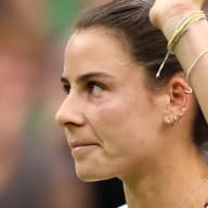 Emma Navarro of United States celebrates winning match point against Naomi Osaka of Japan in her Women's Singles second round match during day three of The Championships Wimbledon 2024 at All England Lawn Tennis and Croquet Club on July 03, 2024 in London, England.