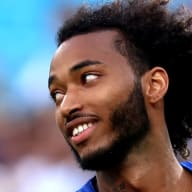 Gianluca Busio #6 of the United States smiles as he runs down the pitch during the first half of the Concacaf Gold Cup match against Trinidad and Tobago at Bank of America Stadium on July 02, 2023 in Charlotte, North Carolina.